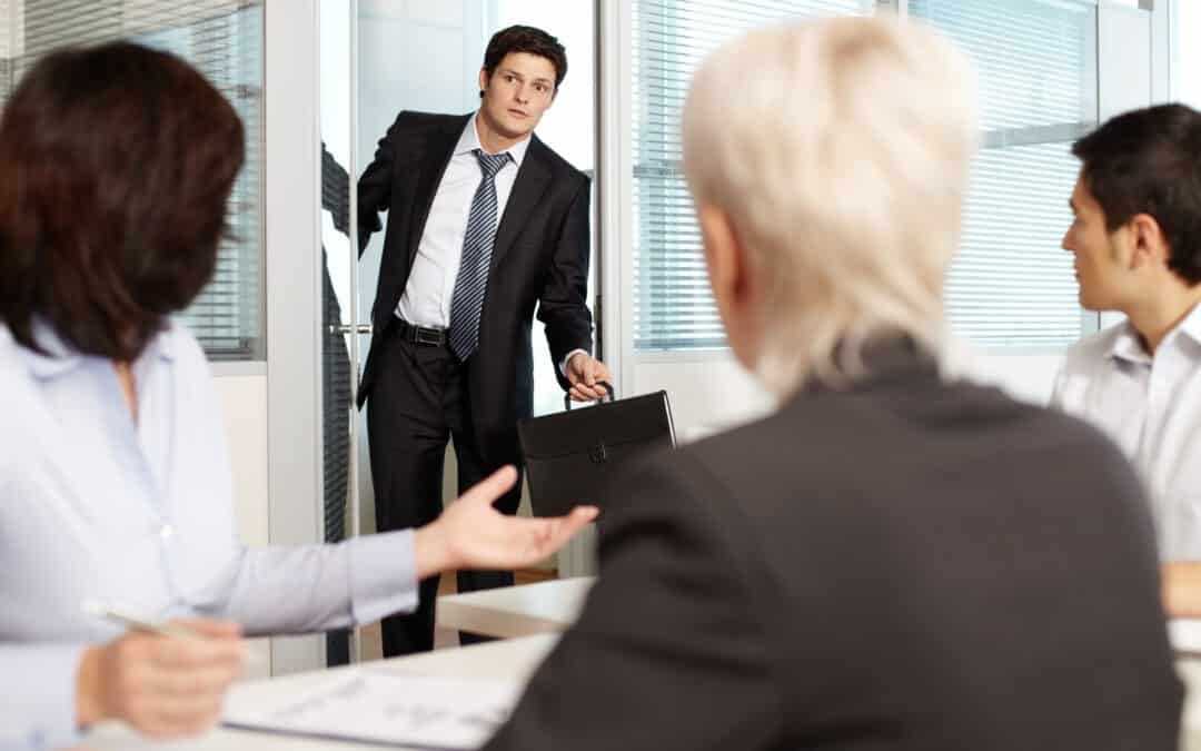 Office worker coming late to meeting
